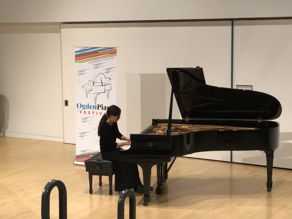 Brooklyn Lee Performing at Steinway Grand Piano