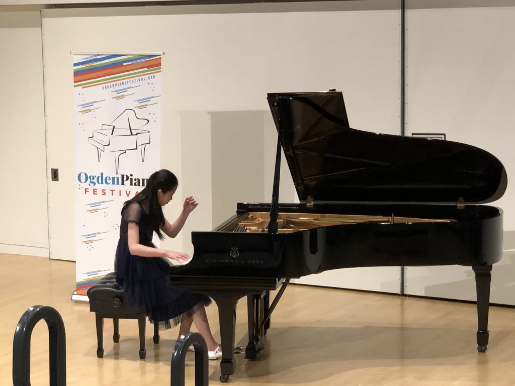 Christina Sung Performing at Steinway Grand Piano