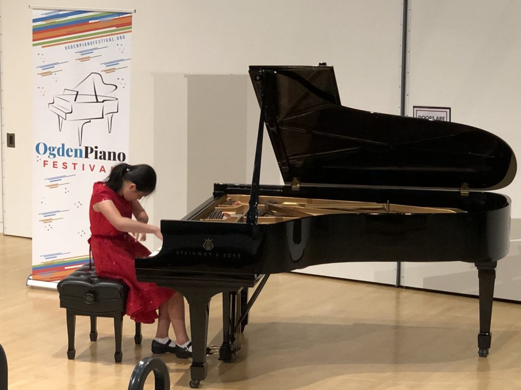Olivia Jiang Performing at Steinway Grand Piano