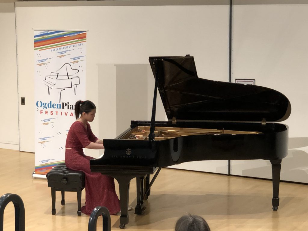 Aimee Lam Performing at Steinway Grand Piano