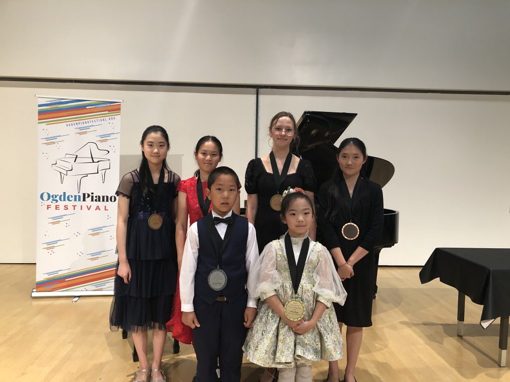Students selected to perform with Orchestra. Front L to R: Maxwell Ji, Natalie Sun; Back L to R: Christina Sung, Olivia Jiang, Emily Runov, Kourtney Jia