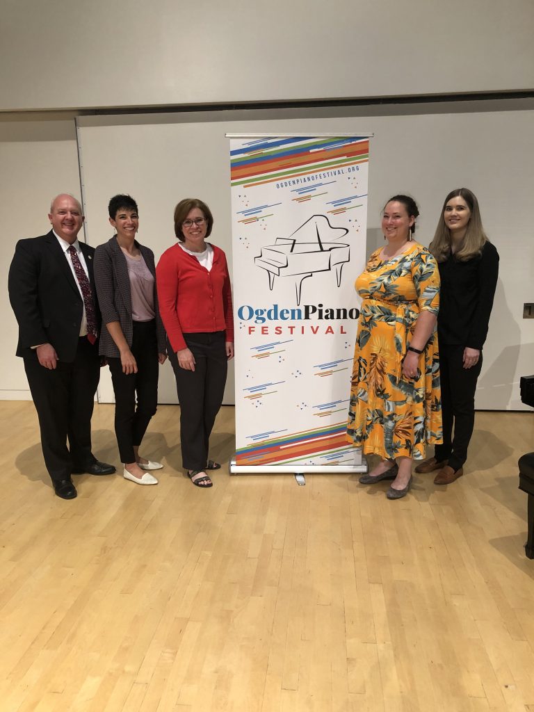 L to R: Sean Stiener, Brienna Favero, Dr. Carmen Hall, Risha Russon, Dr. Hilary Demske with Ogden Piano Festival Banner