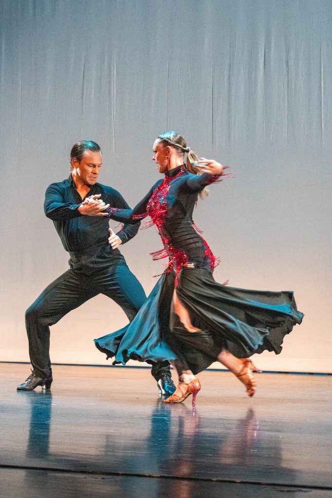 Anika Baker and Tanner Cole Circle Each other in their dance. 