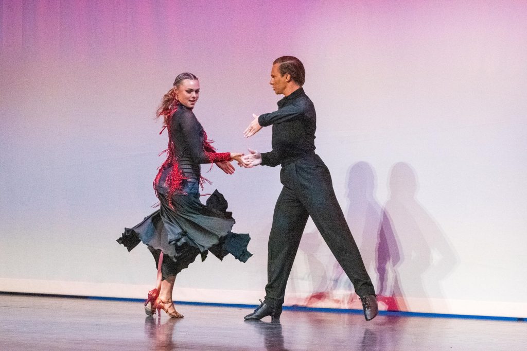 Anika Baker and Tanner Cole Circle Each other in their dance. 