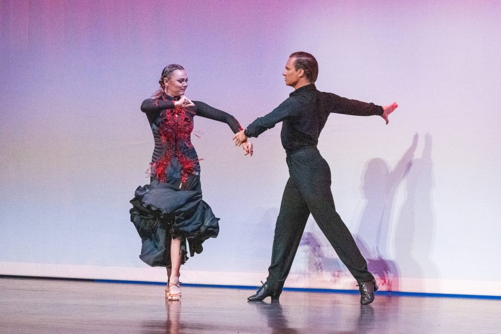 Anika Baker and Tanner Cole Circle Each other in their dance. 