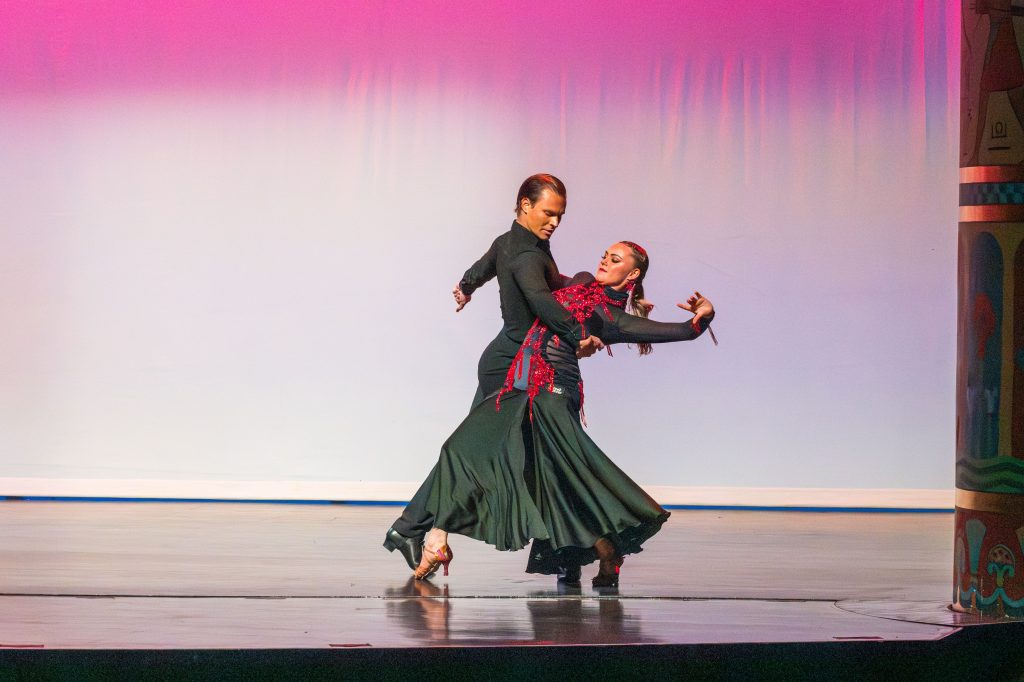 Tanner Cole dips Anika Baker on stage as a part of the dance. 