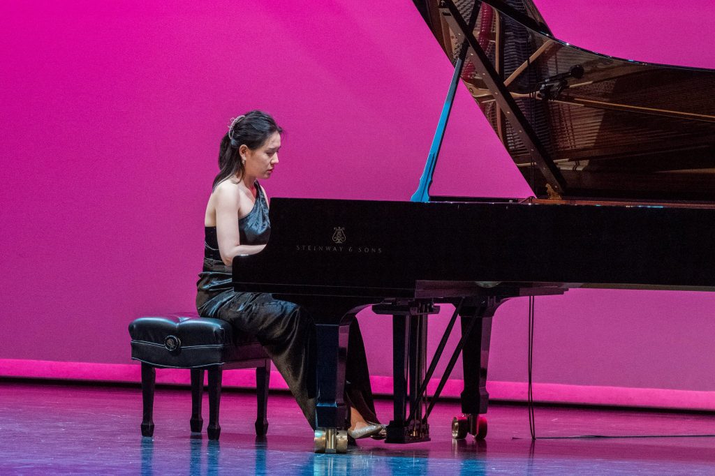 Dr. Esther Jeehae Ahn performs at the piano.